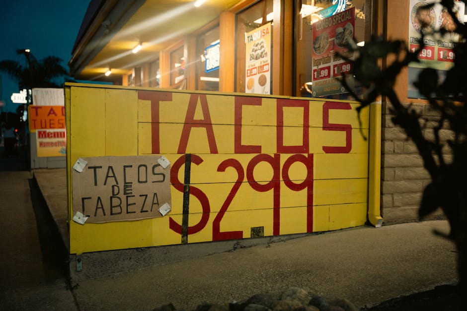 Street taco stand with bold signage and a counter service moment